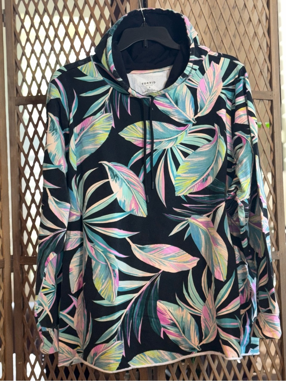 Torrid Pullover Black Hoodie with Pastel Tropical Leaf Print